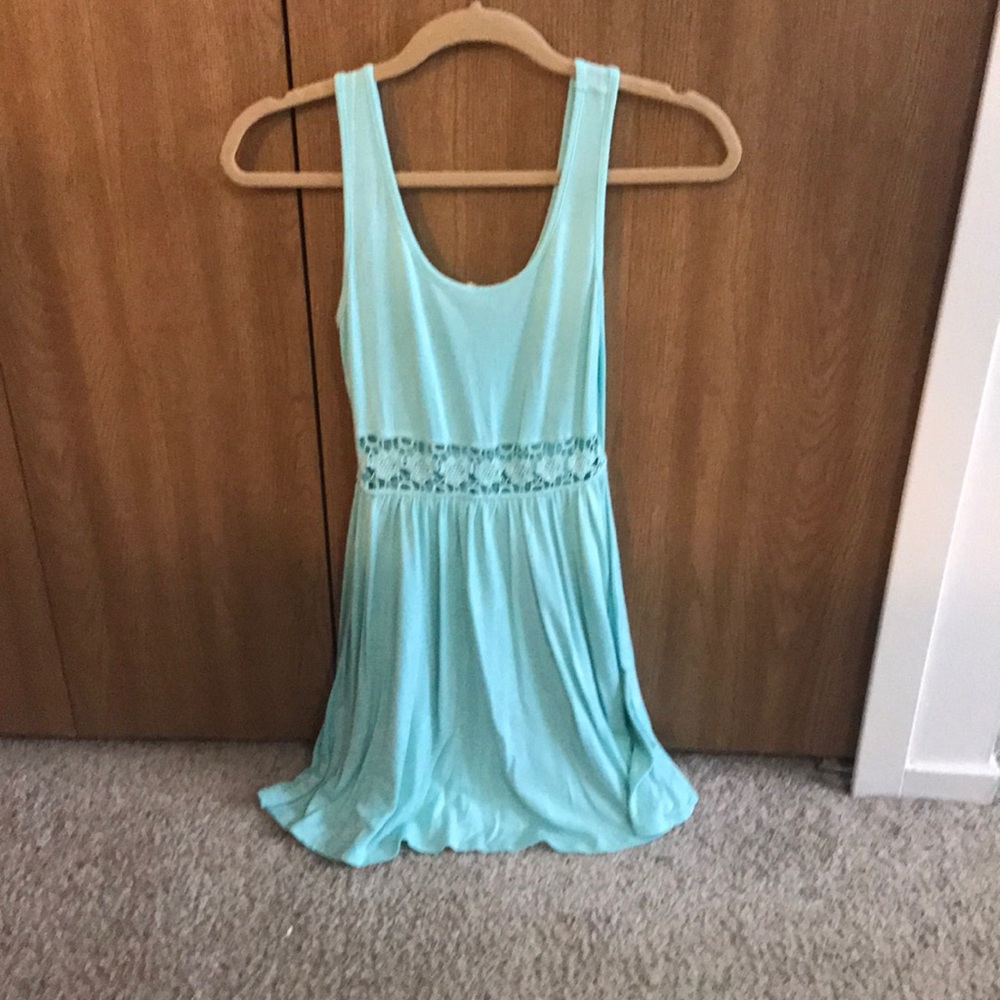 Teal dress w/ skin showing floral pattern midriff